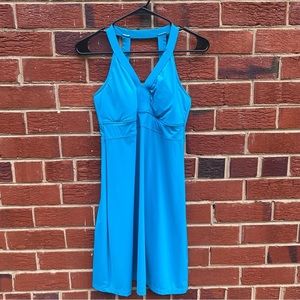 Athleta sleeveless swimming dress V-neck line open back color blue size small